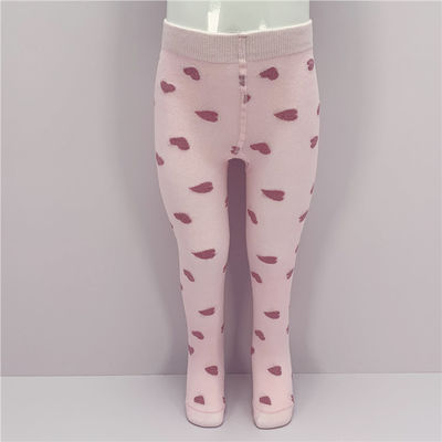 Des collants confortables en coton respirant avec des cœurs roses