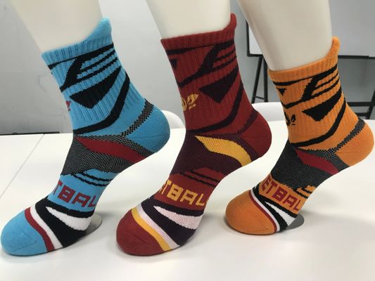 Des chaussettes de sport orange de luxe pour un confort étirant et un football antidérapant