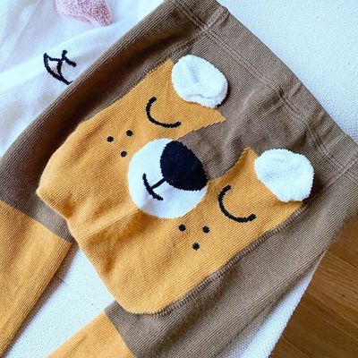 Des collants pour bébés en coton confortable et respirant avec un motif d'animal adorable