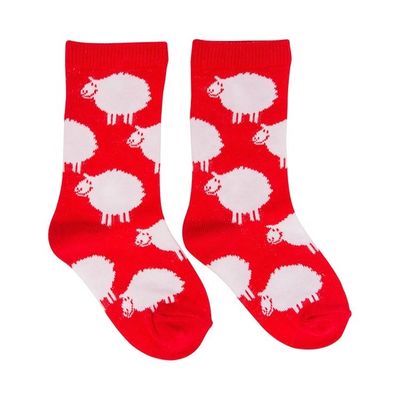 Des chaussettes en rose pour enfants avec un design antidérapant et une épaisseur standard