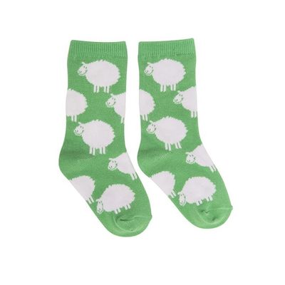 Des chaussettes en rose pour enfants avec un design antidérapant et une épaisseur standard