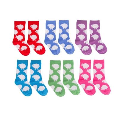 Des chaussettes en rose pour enfants avec un design antidérapant et une épaisseur standard