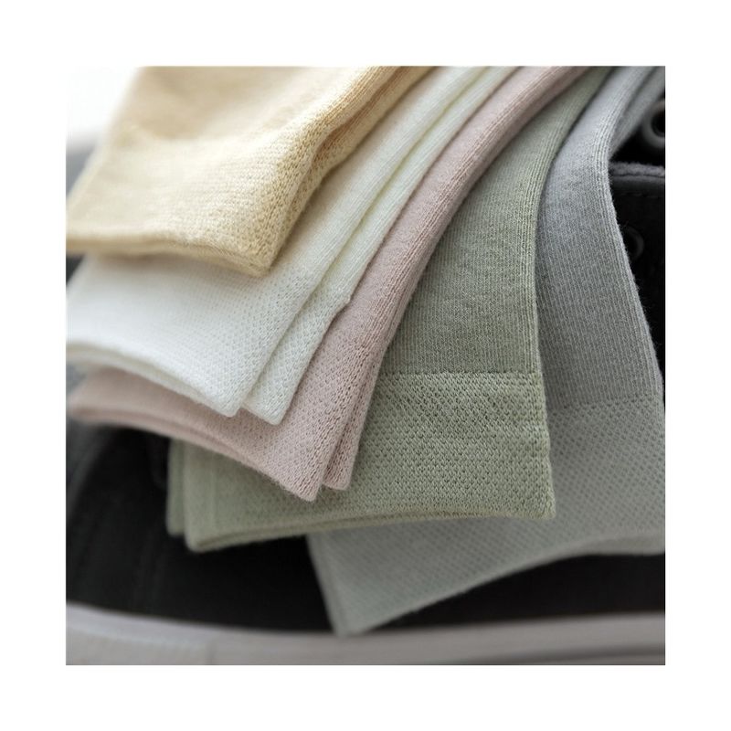 Chaussettes de sport en coton noir et en bambou pour femmes avec travail de compression et épaisseur standard
